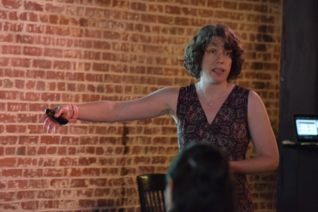 Hannah Grannemann speaking to a group at the North Carolina Theatre Conference in 2019.